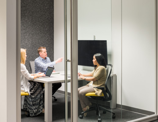Knoll Reff Profiles meeting table and media enclave with grey and yellow ReGeneration ergonomic chairs