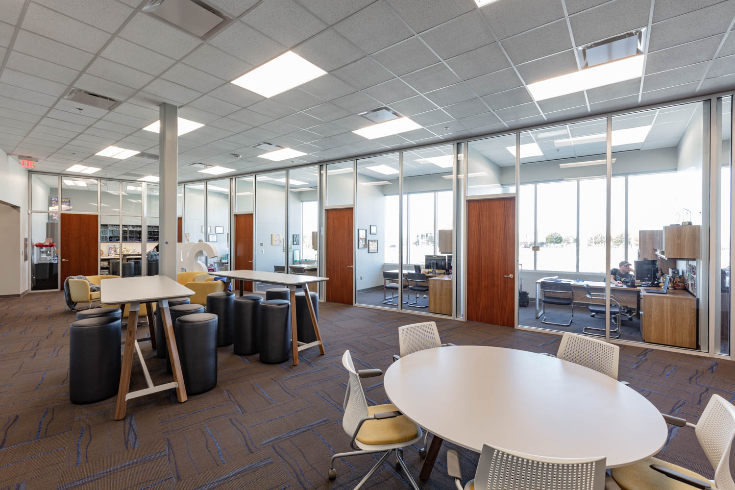 higher education rose state college student union rockwell unscripted tall tables upholstered seats easy table multigeneration knoll light task